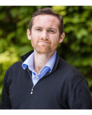 Headshot of Casey Breen, Assistant Professor at UT Austin